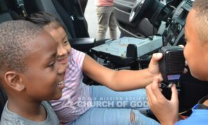 The children were able to see the inside of one of the cop cars.