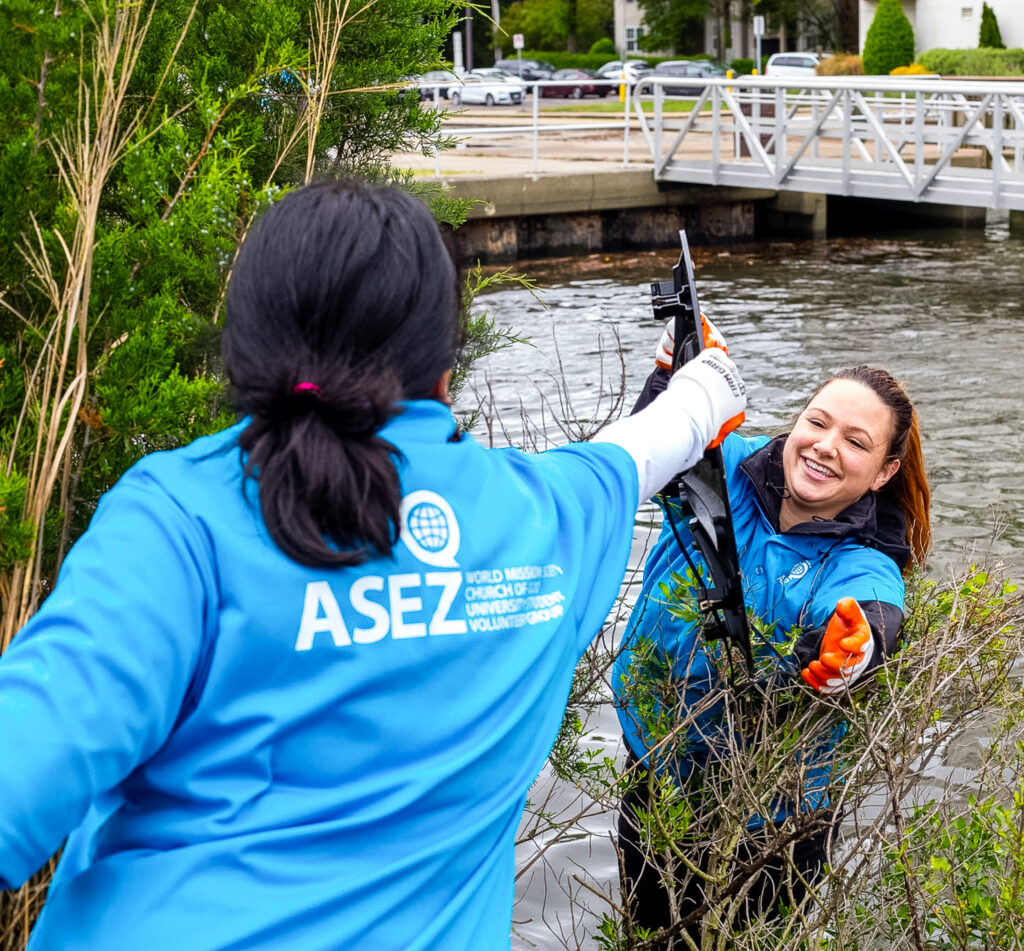 ASEZ volunteers cleaning trash along Haven Creek in Norfolk Virginia