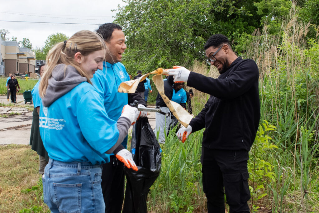 Students removing debris during Haven Creek Boat Ramp cleanup in Norfolk
